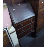 MAHOGANY SMALL BUREAU HAVING THREE DRAWERS AND WRITING FALL OWN SECTION ON CABRIOLE LEGS