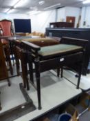 A MAHOGANY PIANO STOOL WITH END HANDLES, BOX SEAT, SQUARE TAPERING LEGS AND ANOTHER SIMILAR PIANO