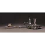 ELECTROPLATED CHAMBER STICK, Rococo scroll outline and conical snuffer to the handle, together