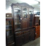 A MAHOGANY TALL DISPLAY CABINET WITH COCKTAIL SECTION, ON BASE WITH DRAWERS AND CUPBOARDS, 4? WIDE