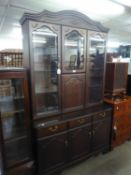 A MAHOGANY TALL DISPLAY CABINET WITH COCKTAIL SECTION, ON BASE WITH DRAWERS AND CUPBOARDS, 4? WIDE