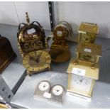 A SMITH BRASS LANTERN CLOCK WITH MAINS ELECTRIC MOVEMENT, THREE SMALL CLOCKS, A SMALL GILT CHERUB