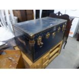 A LARGE FIBRE AND METAL BOUND CABIN TRUNK WITH LIFT OUT TRAY