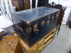 A LARGE FIBRE AND METAL BOUND CABIN TRUNK WITH LIFT OUT TRAY