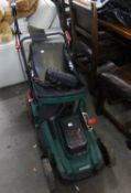 A BATTERY OPERATED HIGH SPEED 'PARKSIDE' LAWN MOWER WITH GRASS BOX