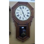 A 19TH CENTURY OAK ANSONIA, AMERICAN, DROP DIAL WALL CLOCK WITH STRIKING MOVEMENT (LACKS GLASS)