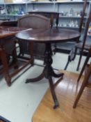 REGENCY STYLE MAHOGANY CIRCULAR OCCASIONAL TABLE, ON COLUMN ON SWEPT TRIPOD SUPPORTS AND BRASS