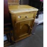 A MODERN PINE SMALL CUPBOARD WITH DRAWER ABOVE