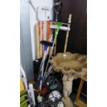 SEVEN ITEMS OF GARDEN TOOLS AND BRUSHES; WATERING CAN AND SUNDRY ITEMS INCLUDING AN IRONING BOARD,