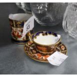 A ROYAL CROWN DERBY IMARI PATTERN MINIATURE MUG, YEAR CYPHER FOR 1901, ALSO A VERY SIMILAR MINIATURE