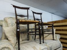 A PAIR OF LATE NINETEENTH CENTURY SIMULATED ROSEWOOD GRAINED BEDROOM CHAIRS, HOLLOWED BACK RAIL,