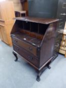 OAK BUREAU WITH SLOPING FALL FRONT, TWO LONG DRAWERS, ON CABRIOLE LEGS WITH PAW FEET (AS FOUND)