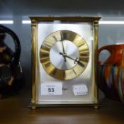WOODFORD BRASS AND GLASS CARRIAGE TYPE BATTERY MANTEL CLOCK