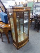 A JOHN LEWIS HEMINGWAY DISPLAY CABINET, WITH BOWED GLASS DOOR AND DRAWER BELOW, ALSO WITH ADJUSTABLE