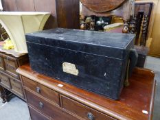 AN EBONISED WOOD MILITARY TRUNK WITH ROPE CARRYING HANDLES