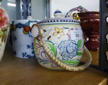 POOLE POTTERY BISCUIT BARREL AND A LOSOL WARE ?CHANDOS? PATTERN BISCUIT BARREL WITH CANE BOUND SWING