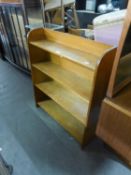 AN OAK FOUR TIER OPEN BOOKCASE