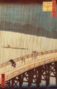 AFTER HIROSHIGE COLOUR PRINT OF A WOODBLOCK PRINT Figures crossing a bridge in the rain 13? x