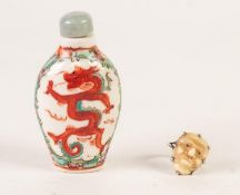 * ORIENTAL OVOID PORCELAIN SNUFF BOTTLE, painted with orange dragons and the stopper; EARLY 20th