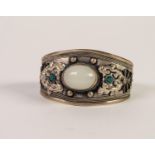 BROAD SILVER COLOURED METAL TORQUE BANGLE, the top collet set with a large oval cabochon moonstone