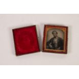 VICTORIAN CASED PHOTOGRAPHIC IMAGE, of a man, (c/r the case now in two parts)