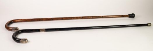 TWO LATE VICTORIAN/EDWARDIAN SILVER MOUNTED WALKING STICKS, hallmarks indistinct (2)