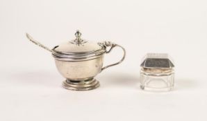 * SILVER CIRCULAR MUSTARD POT with loop handle and vase finial, the BLUE GLASS LINER and a SILVER