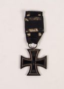 WORLD WAR I GERMAN IRON CROSS 2nd CLASS, dated 1914, reverse 1813, with ribbon