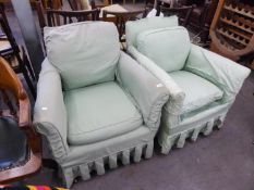 A PAIR OF EDWARDIAN LOUNGE CHAIRS, WITH PALE GREEN LOOSE COVERS