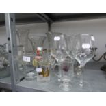 A STUDIO GLASS BALUSTER VASE, DRINKING GLASSES AND OTHER GLASS WARE