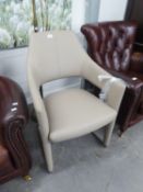 A DINING CHAIR WITH ARMS, TAUPE LEATHERETTE, STEEL LEGS (seat 88cm high x 56cm wide x 45cm deep)