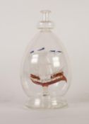 20th CENTURY GLASS FOUR-MASTED SQUARE RIGGED SHIP IN A DECANTER FORM OVOID BOTTLE, the ship with