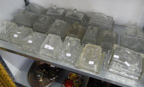 A LARGE COLLECTION OF MOULDED GLASS OBLONG CHEESE OR BUTTER DISHES  (18)