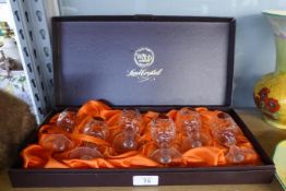 A BOXED SET OF SIX WEBB CUT SHERRY GLASSES