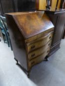 A FIGURED MAHOGANY SMALL BUREAU WITH SLOPING FALL-FRONT, WELL FITTED INTERIOR, THREE LONG DRAWERS