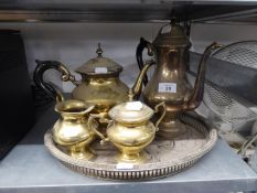 AN ELECTROPLATE FOUR PIECE  TEA AND COFFEE SERVICE AND A TRAY