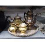 AN ELECTROPLATE FOUR PIECE  TEA AND COFFEE SERVICE AND A TRAY