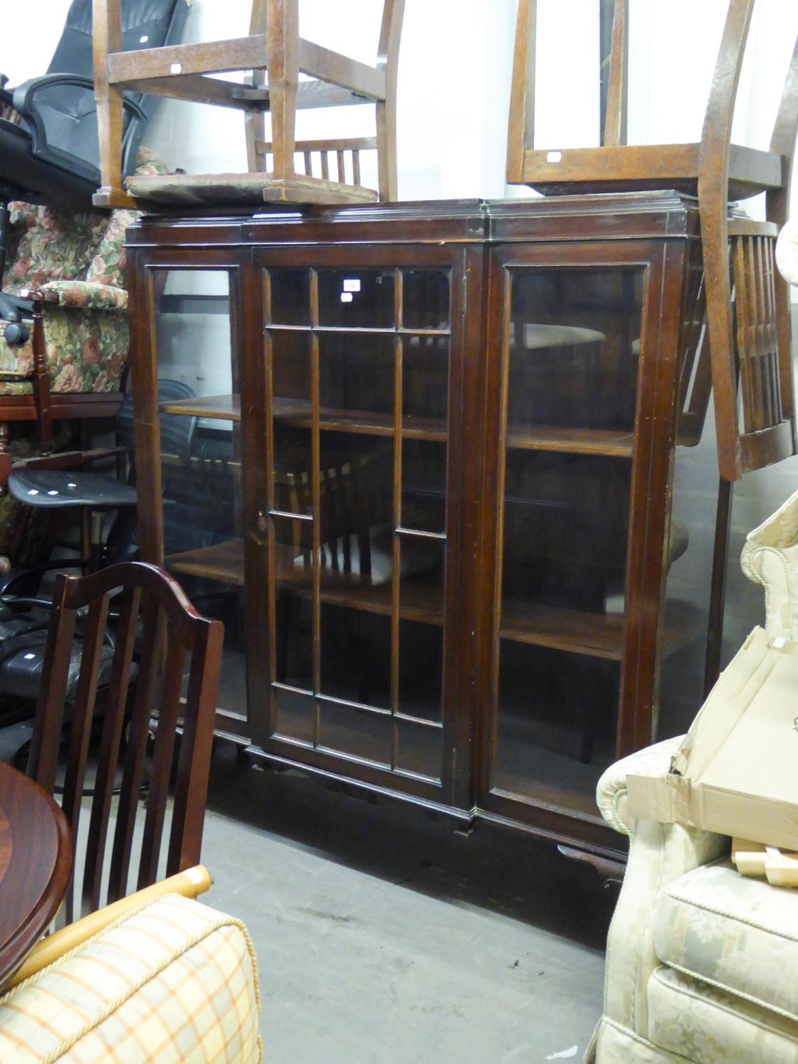 DARK MAHOGANY LARGE BREAKFRONT DISPLAY CABINET WITH SINGLE GLAZED PANEL CENTRE DOOR FLANKED BY