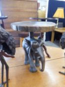 INDIAN TEAK CIRCULAR TOPPED LAMP TABLE, ON LARGE CARVED ELEPHANT SUPPORT, 1?2? DIAMETER, 1?6? HIGH