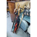 FIVE UMBRELLAS, 4 WOODEN WALKING STICKS, A SHOOTING STICK AND TWO METAL ADJUSTABLE WALKING STICKS