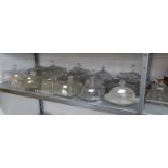 A LARGE COLLECTION OF MOULDED GLASS OBLONG CHEESE OR BUTTER DISHES AND COVERS, ALSO FOUR ROUND