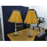 A PAIR OF  GILT METAL AND ONYX TABLE LAMPS AND SHADES