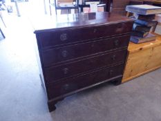 ANTIQUE MAHOGANY CHEST HAVING FOUR GRADUATED DRAWERS WITH RING HANDLES ON BRACKET FEET