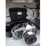 NIKON SLR ROLL FILM CAMERA, A KIRON LENSE AND A PAIR OF  BINOCULARS (3)