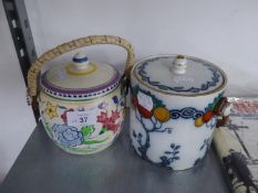 POOLE POTTERY BISCUIT BARREL AND A LOSOL WARE ?CHANDOS? PATTERN BISCUIT BARREL WITH CANE BOUND SWING