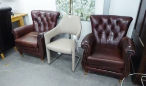 A PAIR OF DARK RED LEATHER FIRESIDE ARMCHAIRS
