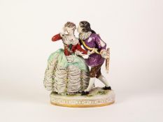 A TWENTIETH CENTURY GERMAN CHINA LACE PORCELAIN MODEL OF A YOUNG COUPLE, she with a blindfold, on an