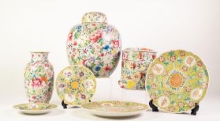 SEVEN PIECES OF CHINESE PORCELAIN with pale famille rose all-over floral decoration, viz a large