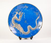 20th CENTURY JAPANESE PORCELAIN LARGE CIRCULAR PLAQUE, sky blue and having embossed white wryting