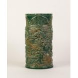 A LARGE CHINESE GREEN JADE CYLINDRICAL VASE, carved in relief with encircling sinuous scaly five